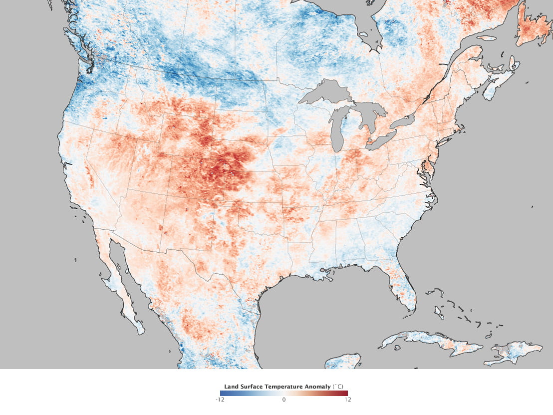 Cooler than average temperatures are shown in Canada and the northern midwestern states in blue with warmer than average temperatures across much of the mainland US in red